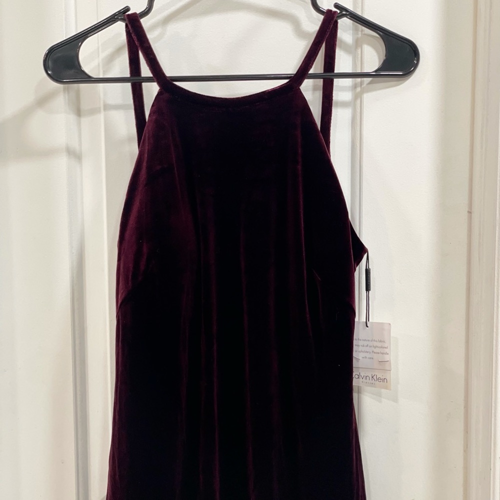 Calvin Klein velvet evening dress in the color burgundy, size 8, new with tag.
